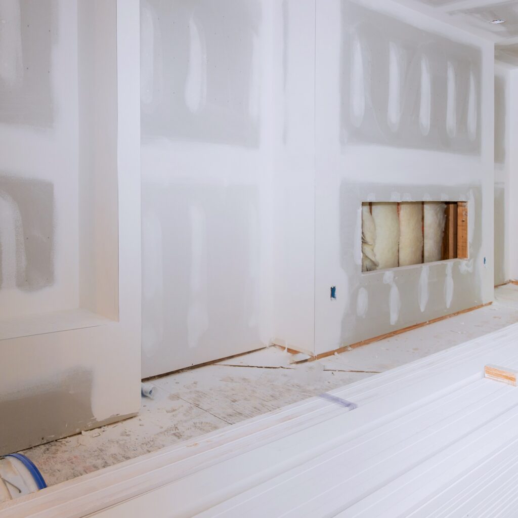 House hall interior with drywall completely installed and painted wall